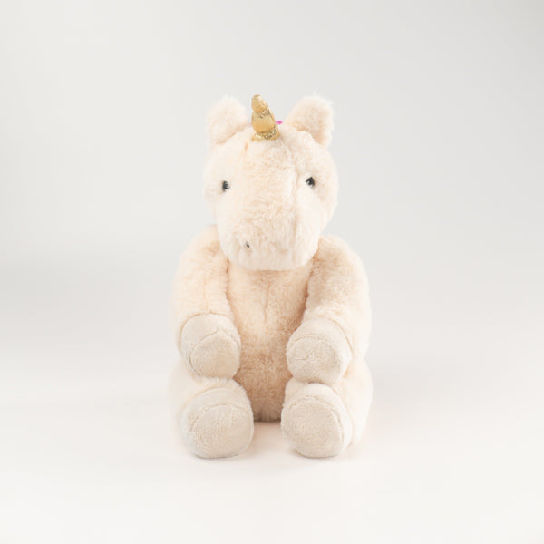 Wonderlings Gilbert Unicorn plush toy, front view.