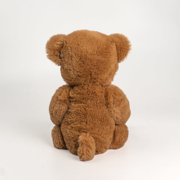 Wonderlings Theodore Teddy Bear plush toy, back view.