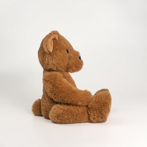 Wonderlings Theodore Teddy Bear plush toy, side view.